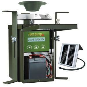 Texas Hunter 12 Volt Wildlife Feeder Kit Inside View with 12 Volt Rechargeable Battery and 12 Volt Solar Charger