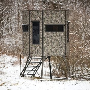 Texas Hunter Products 5' x 7' Wrangler Hide-A-Way Camo Hunting Blind with Combination Rifle and Bow Windows and 4-foot Powder-coated Steel Tower, with Full Door and Full Height Handrails.